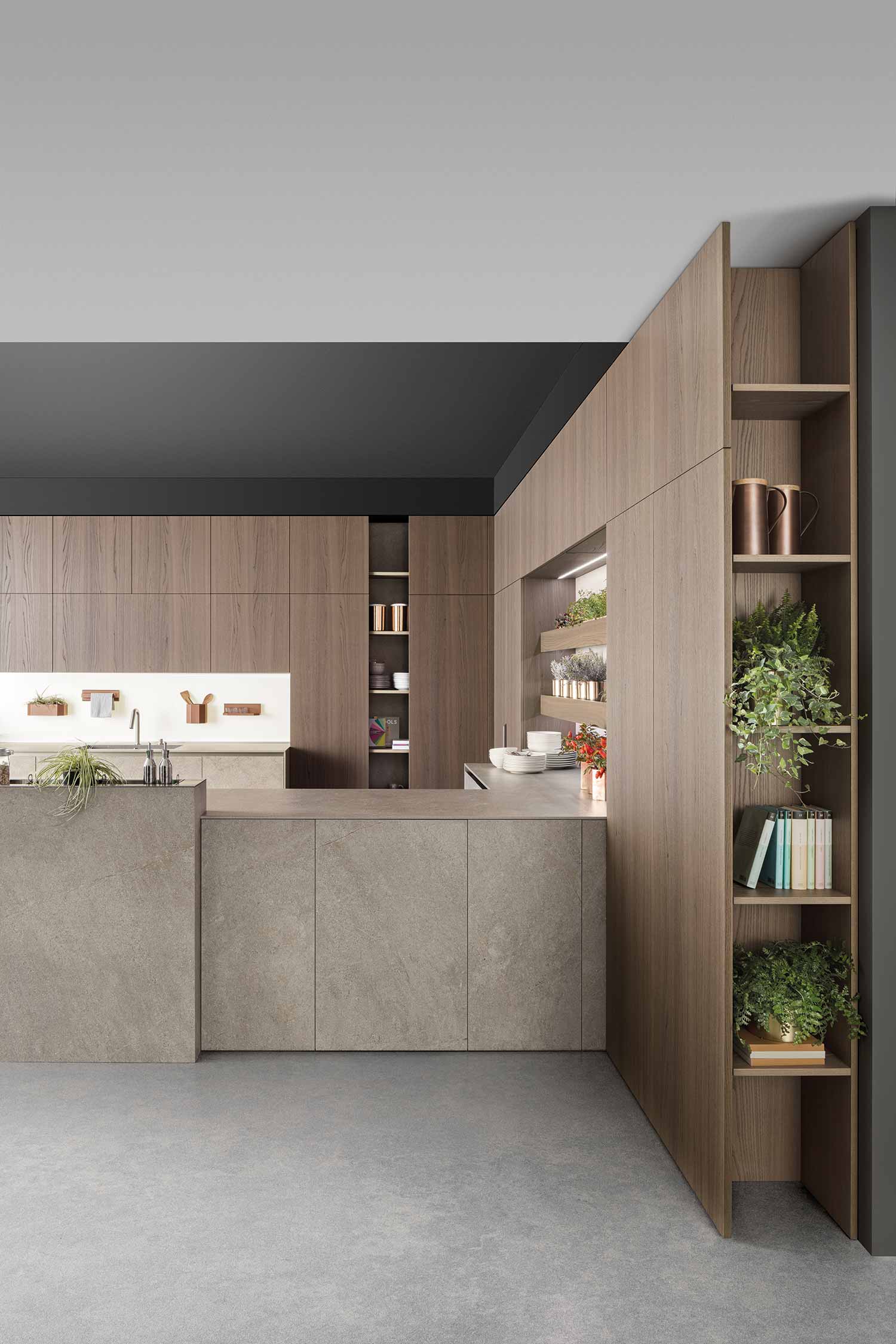 The open unit at the end of the kitchen welcomes people into the kitchen space.