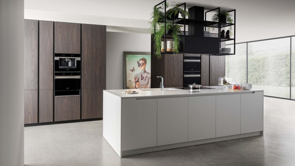 Luxury modern white handleless kitchen with elegant wood veneer and silestone calacatta marble