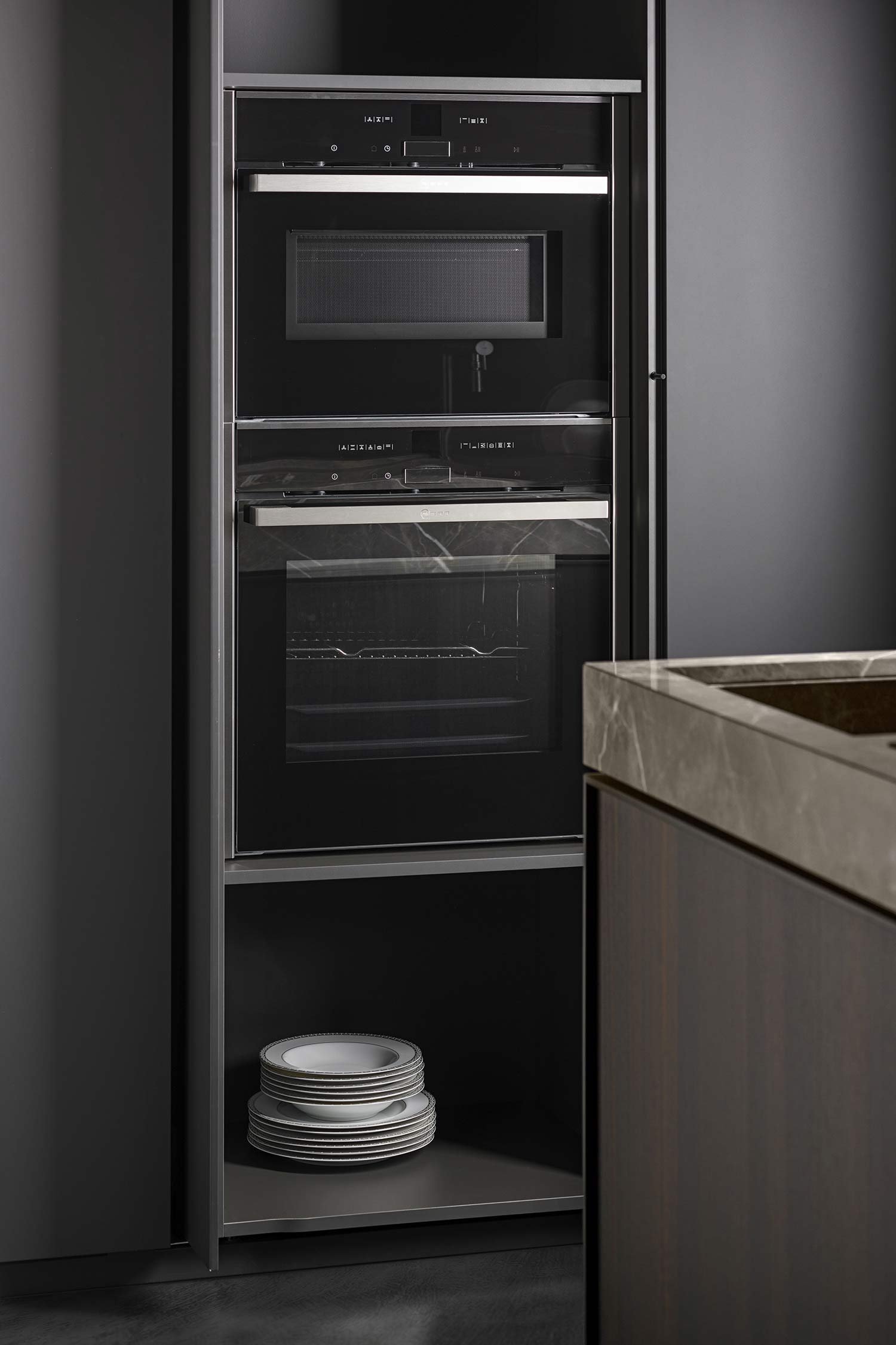 Luxury kitchen appliances integrated into the kitchen wall units.
