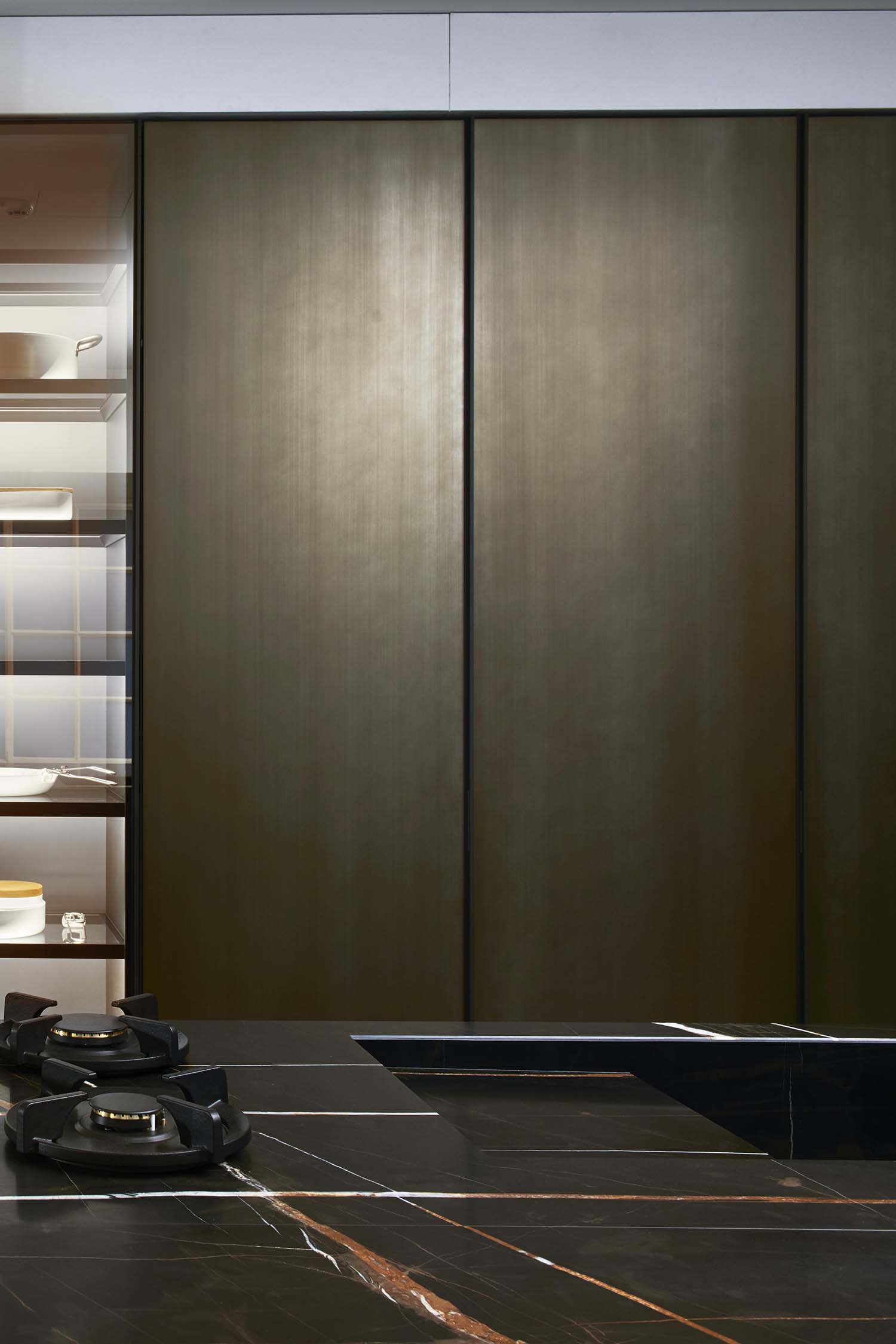 Modern and luxury satin brass colour liquid metal kitchen tall unit doors