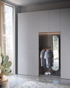 Modern Italian wardrobe with varied colour combinations. Designed and fitted in the UK by Krieder.
