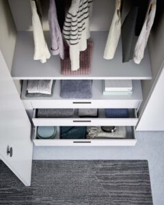 Modern Italian wardrobe with varied colour combinations. Designed and fitted in the UK by Krieder.