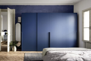 Luxury designer Italian sliding wardrobe with handles. Designed and installed by Krieder.