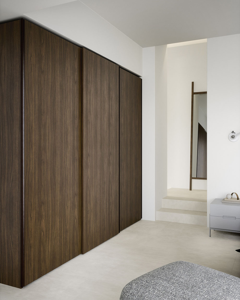 Contemporary sliding wardrobe designed and fitted by Krieder.