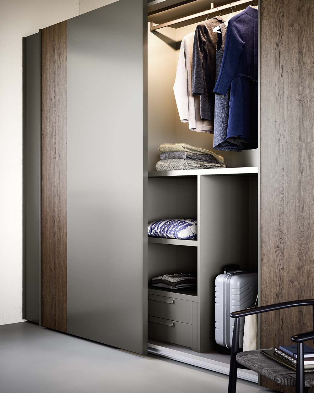 A luxury, modern and contemporary sliding wardrobe. Made in Italy with a choice of mirror, wood and matt lacquered finishes. Designed and installed by Krieder.