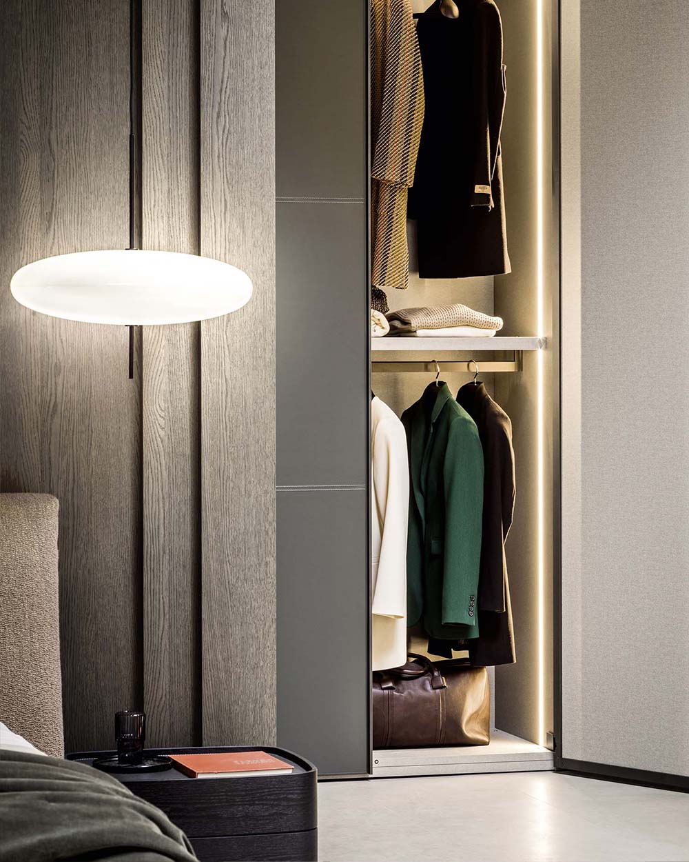 Modern, luxury glass wardrobe system. Designed to fit your interior and fitted by Krieder interior experts.