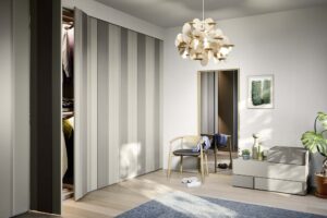 Modern, unique Italian designed bedroom wardrobe with luxury finishes. Designed and fitted by Krieder in the UK.