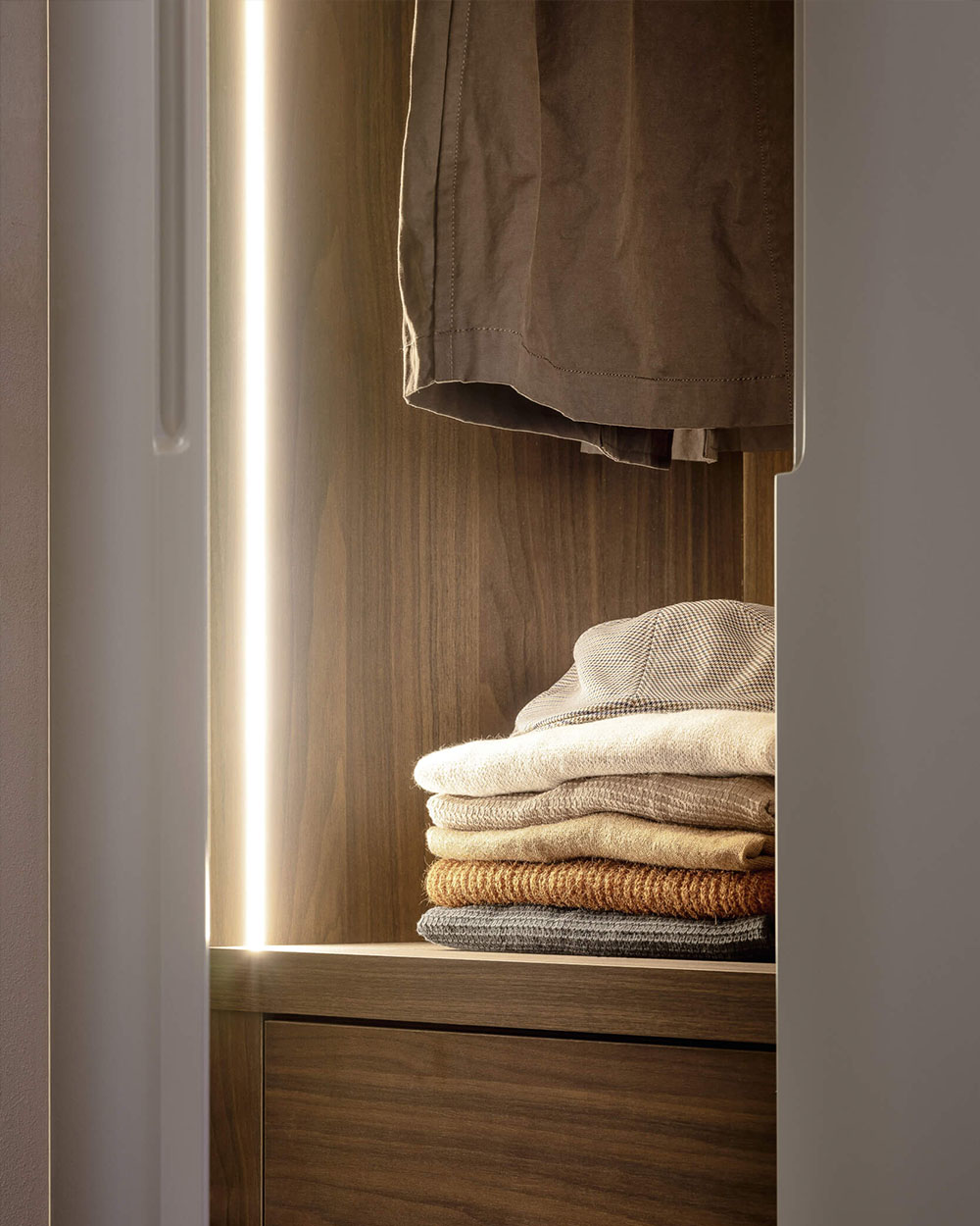 Modern, designer fitted wardrobe. Designed to fit your interior and fitted by Krieder interior experts.