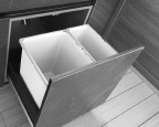 Built in outdoor kitchen bin drawer. Outdoor kitchens designed and fitted by Krieder in the UK and Europe.