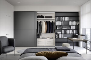 Modern grey sliding wardrobe in luxury matt lacquer. Designed and fitted by Krieder UK.