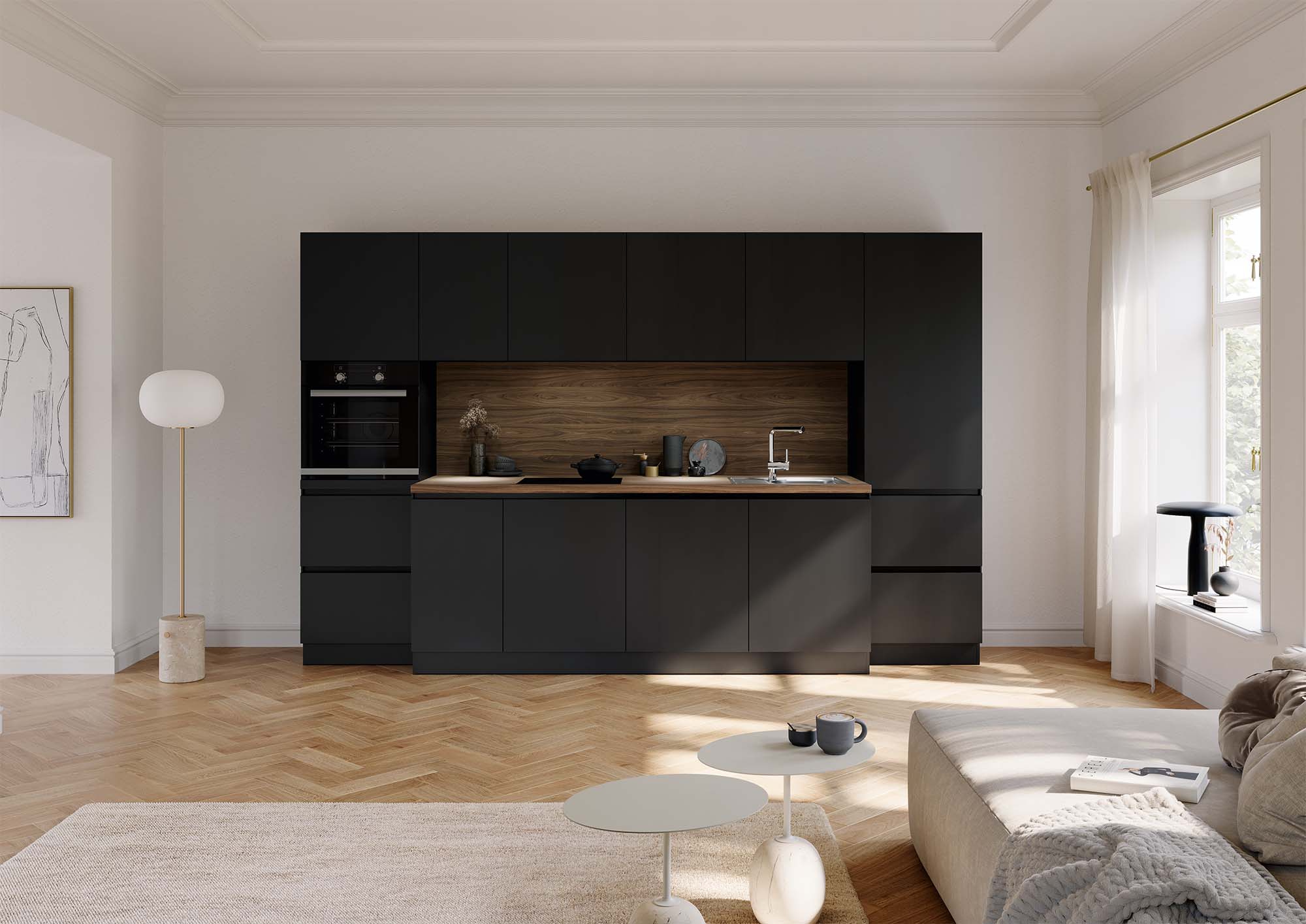 Elegantly designed black small kitchen by Krieder UK