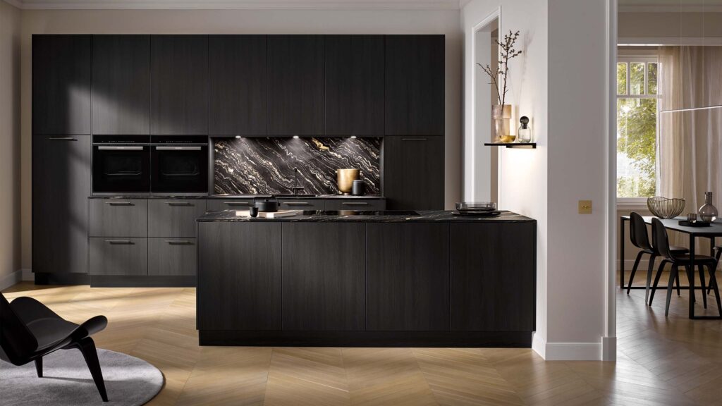 Modern black / gold marble and wood kitchen.
