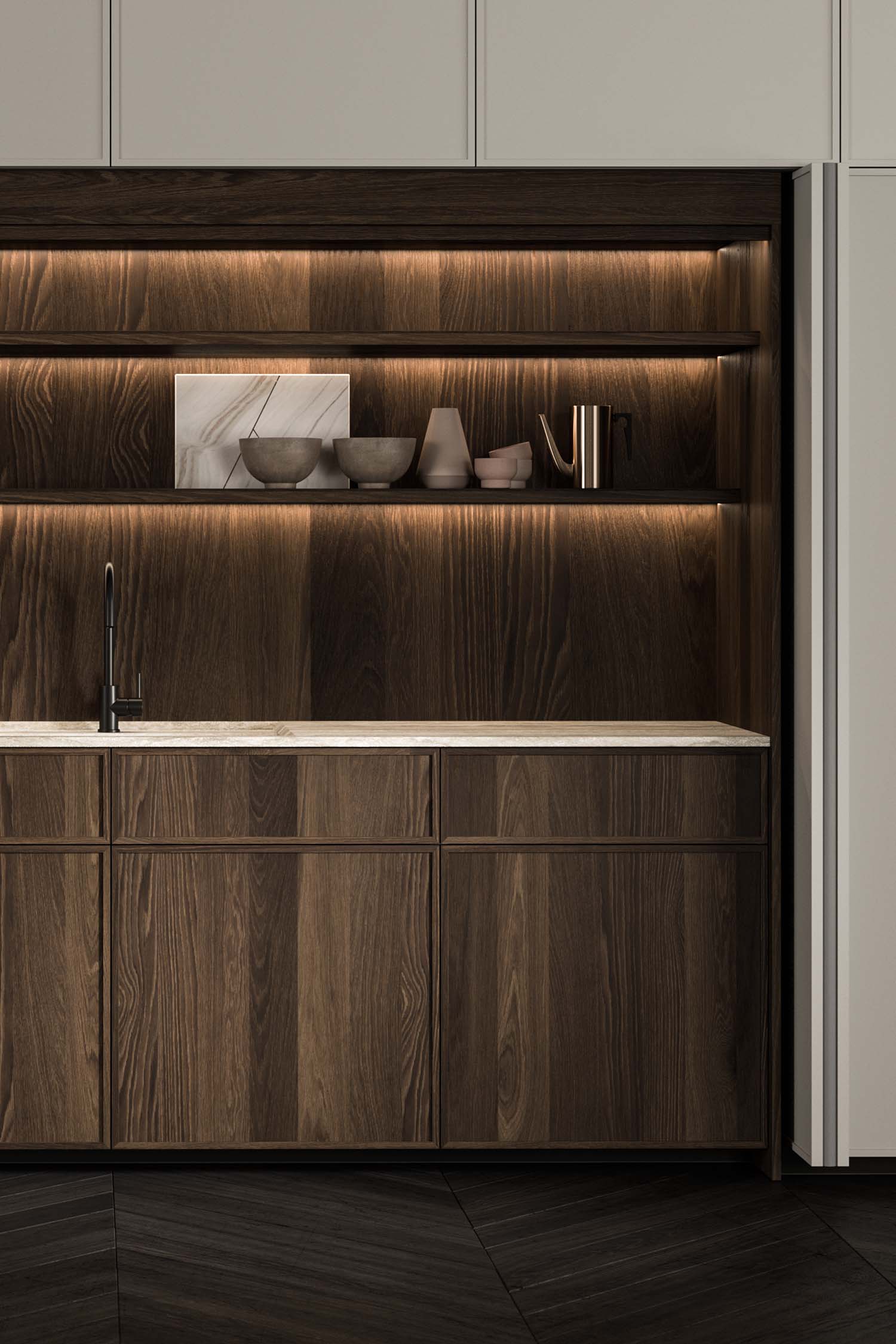 A detailed shot focusing on the pull-out metal handles of a set of tall kitchen units or a pantry, emphasizing their minimalist, vertical design.