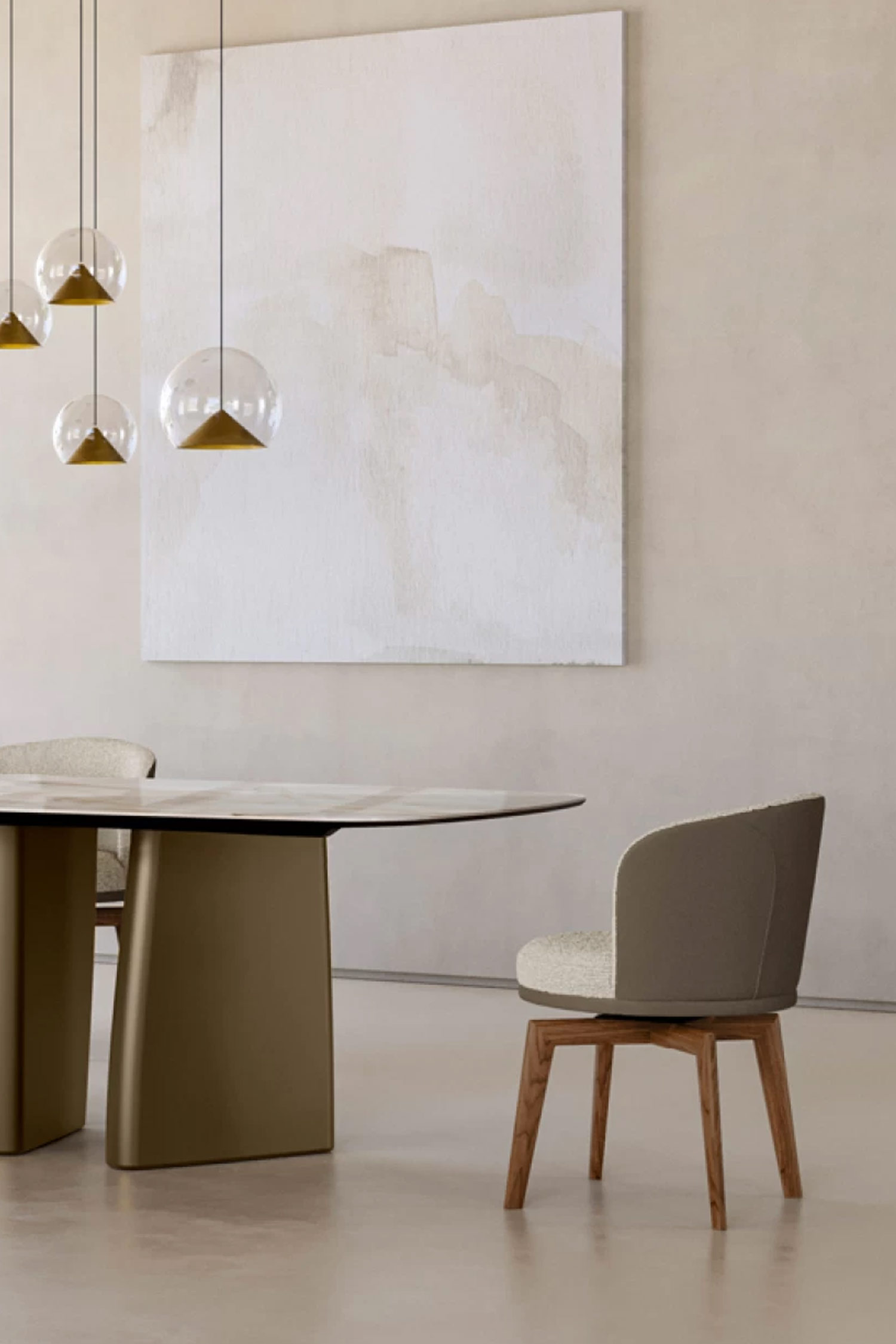 A detail shot showing the rich bronze pedestal base of a luxury dining table with a round, light marble top. To the right, a modern dining chair with a taupe leather exterior, a beige textured seat, and a wooden swivel base is visible. The background features a tall, abstract white canvas on a soft beige wall, with several hanging glass pendant lights on the left.