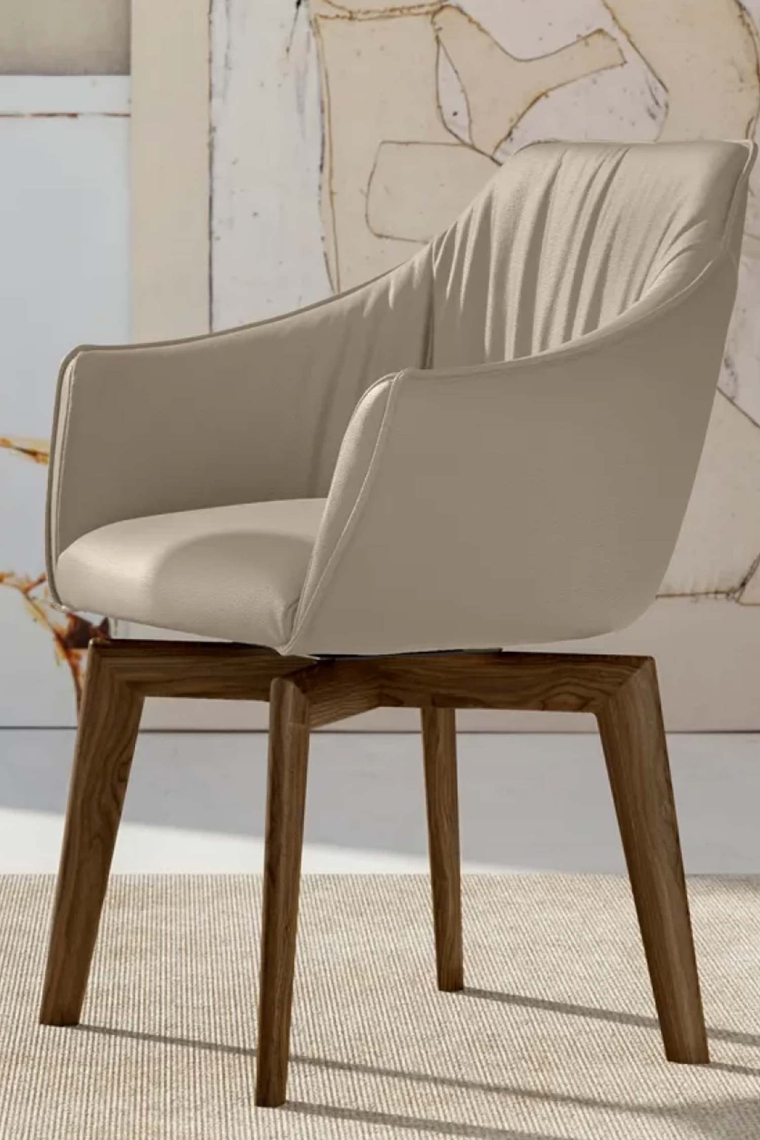A close-up of the Era luxury dining chair, highlighting its cream-colored leather upholstery and the wooden legs on a textured rug.