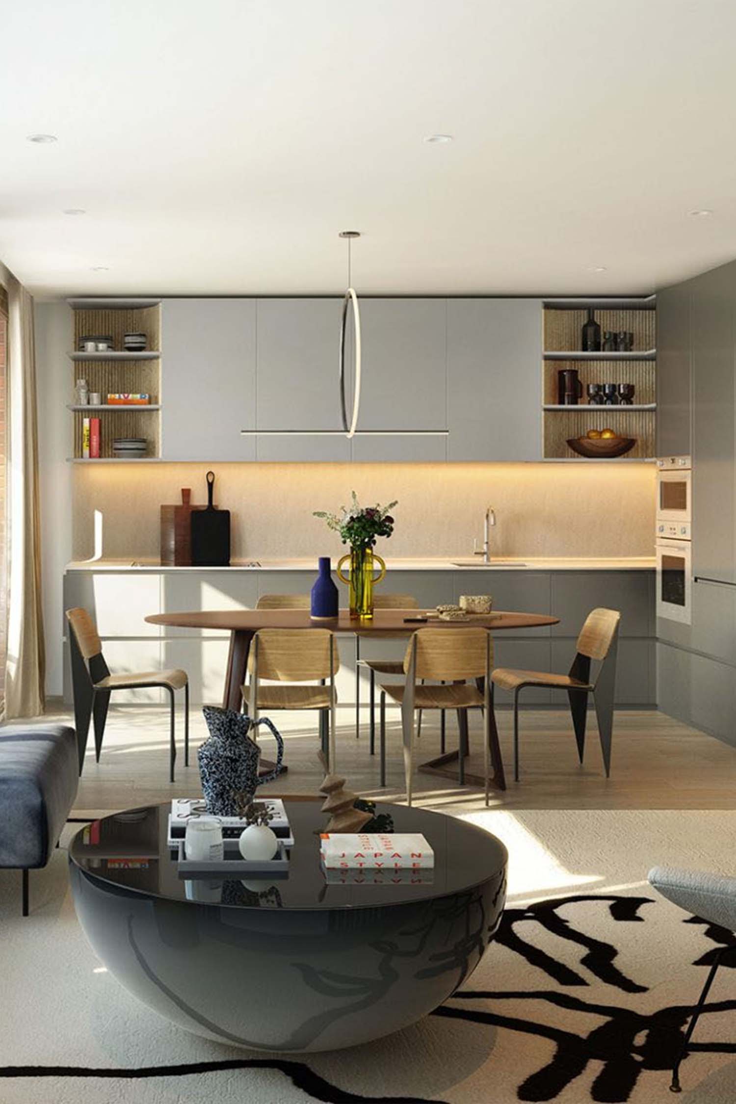 Detailed view of the seamless quartz worktop and integrated handleless cabinetry in the luxury kitchen at Cadence, King's Cross.