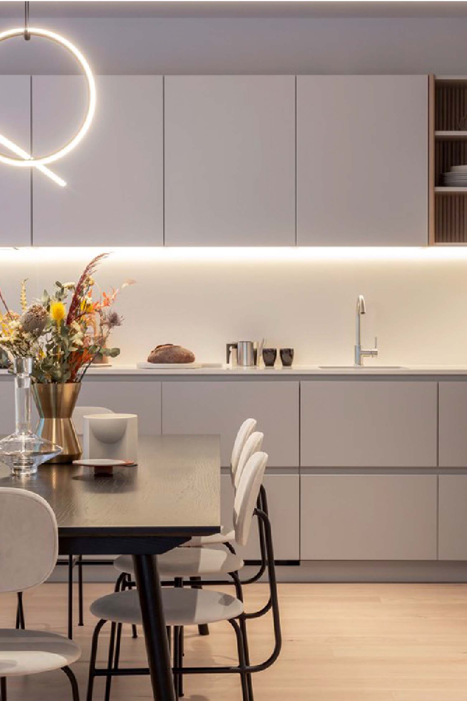 Close-up of the integrated sink and modern tap fixture in the Krieder contract kitchen at the Cadence, London development.