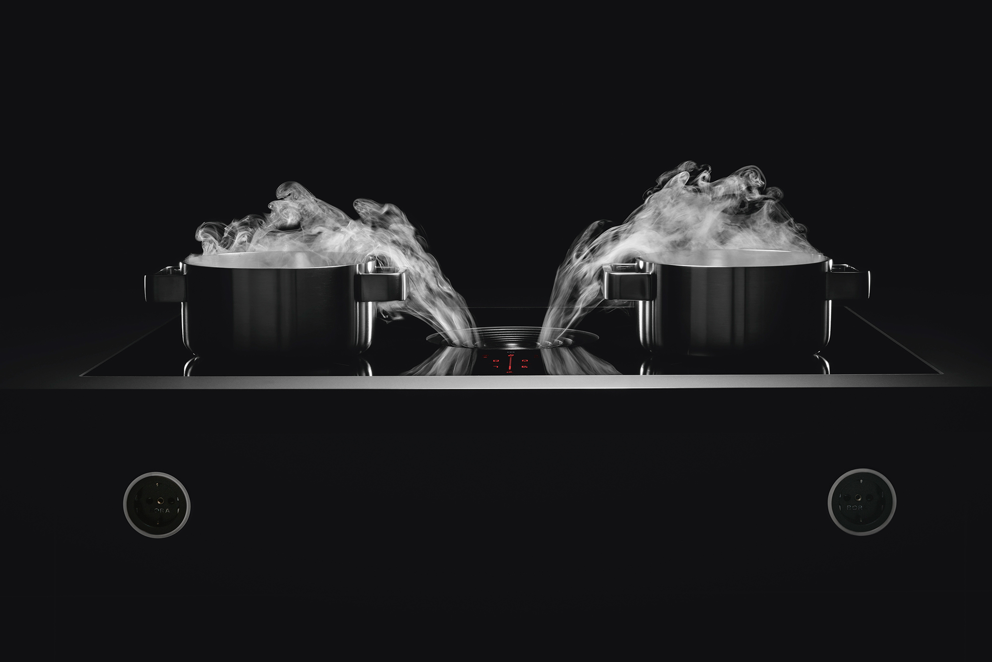 Bora cooktop with integrated extraction in a modern luxury kitchen setting