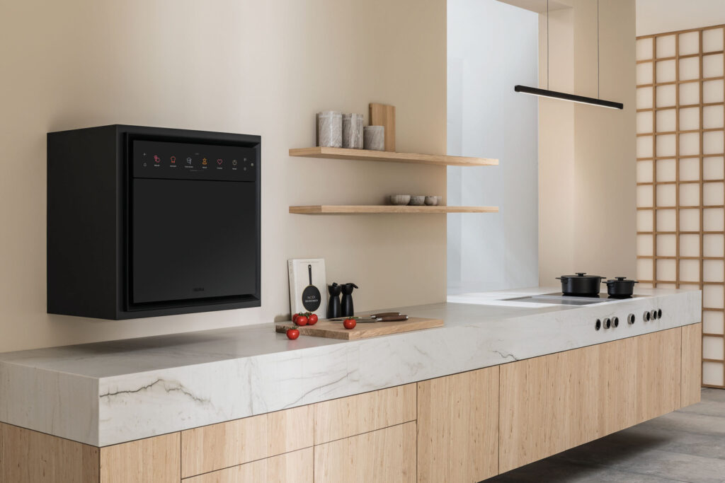 Modern kitchen with BORA X BO steam oven and BORA cooktop, blending minimalist design and professional performance.