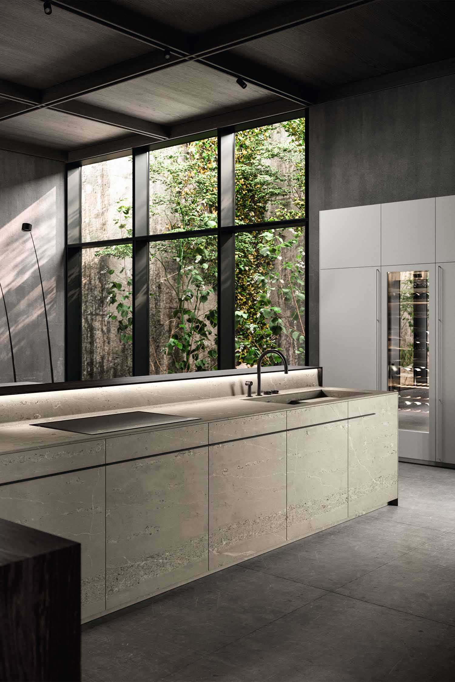 Handleless luxury kitchen with integrated Gaggenau appliances and floor-to-ceiling glazing in Chislehurst home by Krieder Studio