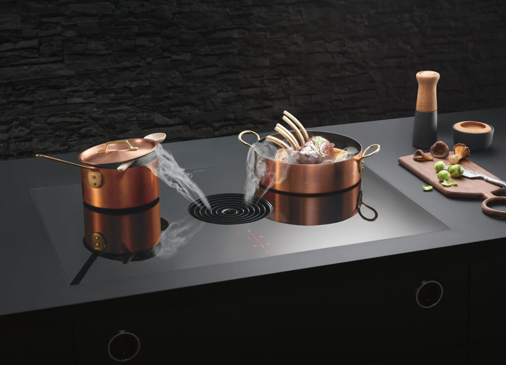 BORA Pure in copper colouring with downdraft ducting.