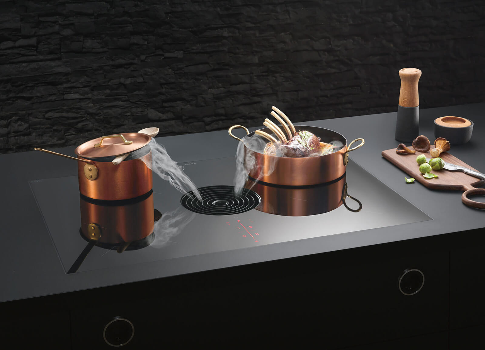 BORA Pure in copper colouring with downdraft ducting.
