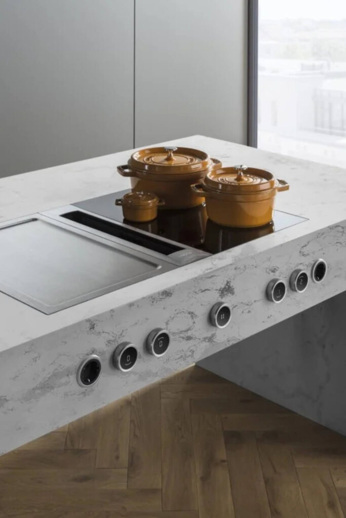 BORA Professional cooktop with black control knobs with teppanyaki and pressure controlled induction hob.