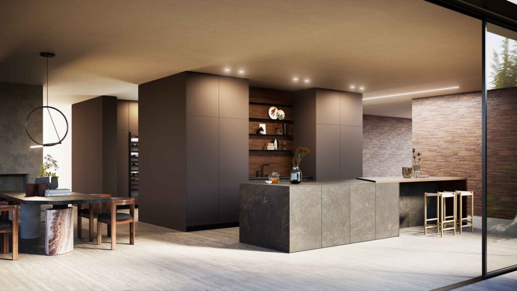 Modern luxury kitchen with dark handleless cabinetry, stone island and open-plan dining area with warm architectural lighting.